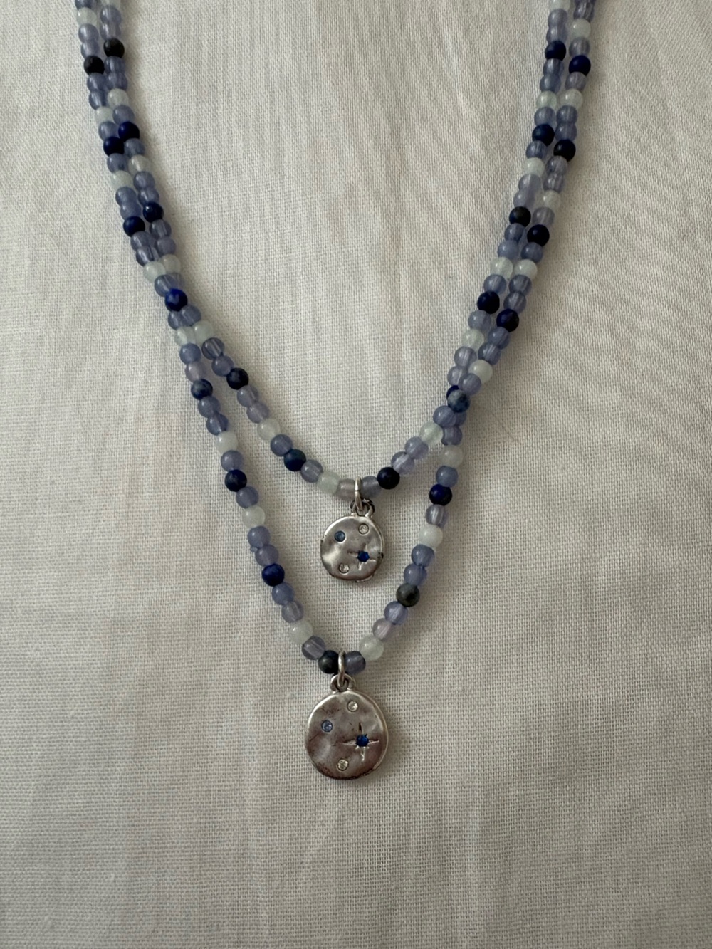 Delicate Blue Beaded Double-Strand Necklace with Silver Star Discs